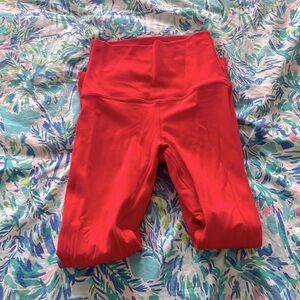 reddish orange lulu leggings 23 inchessize 0